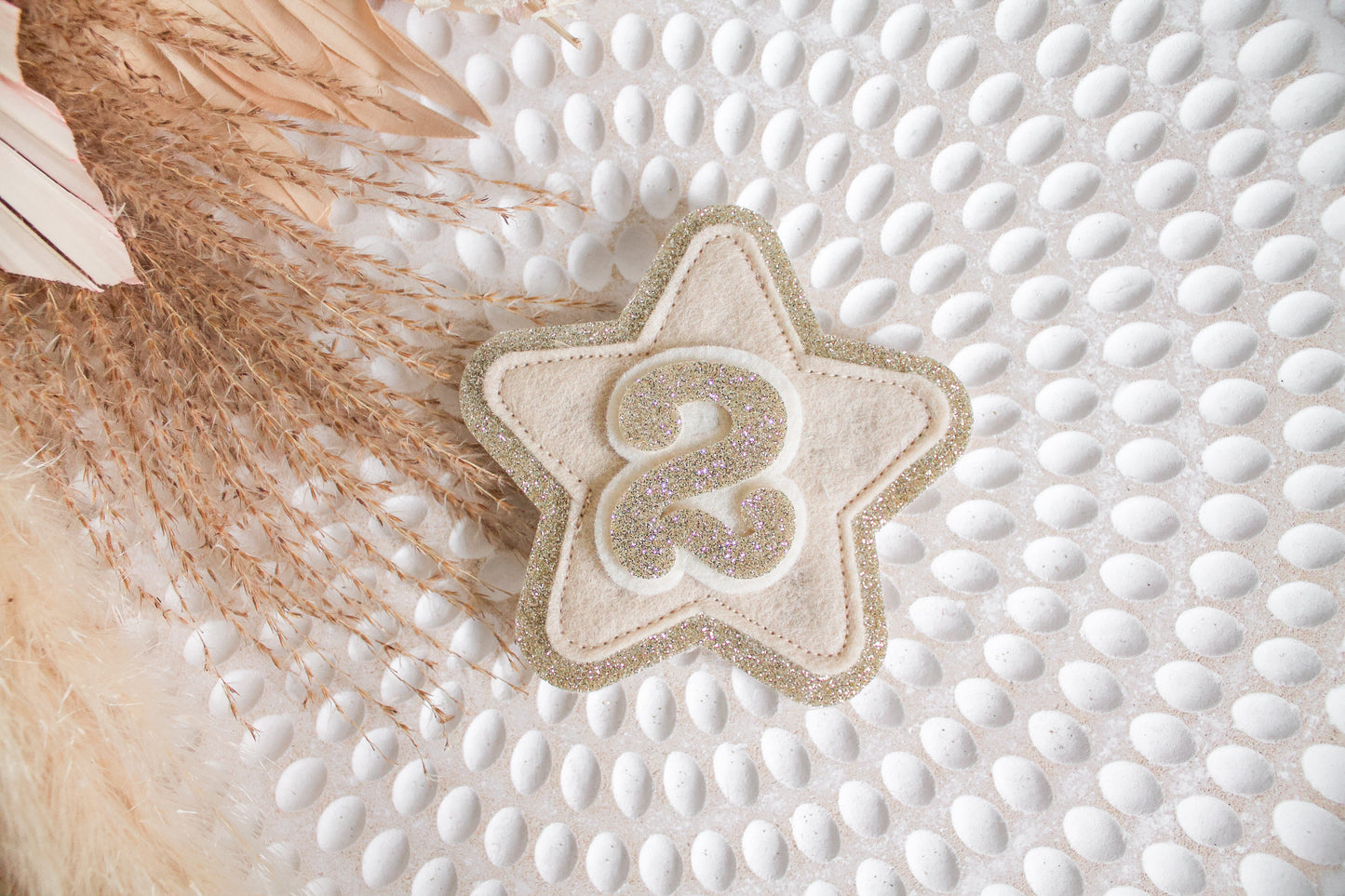 ALMOND 2 STAR FELT BADGE